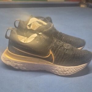 Black and Gold Nike Shoes